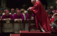 Pope Francis praying